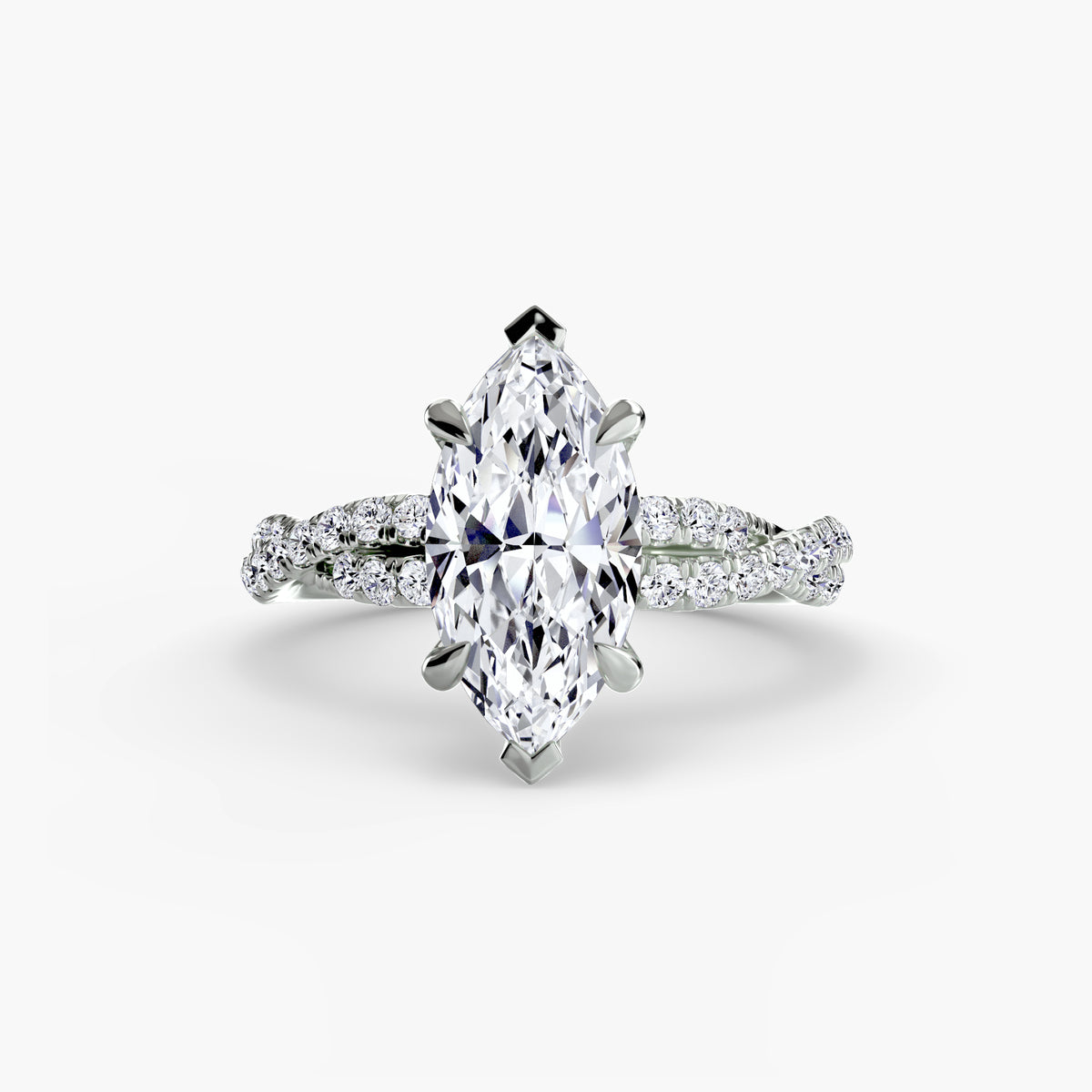 The Twisted Pavé Solitaire engagement ring in white gold with a marquise centre stone