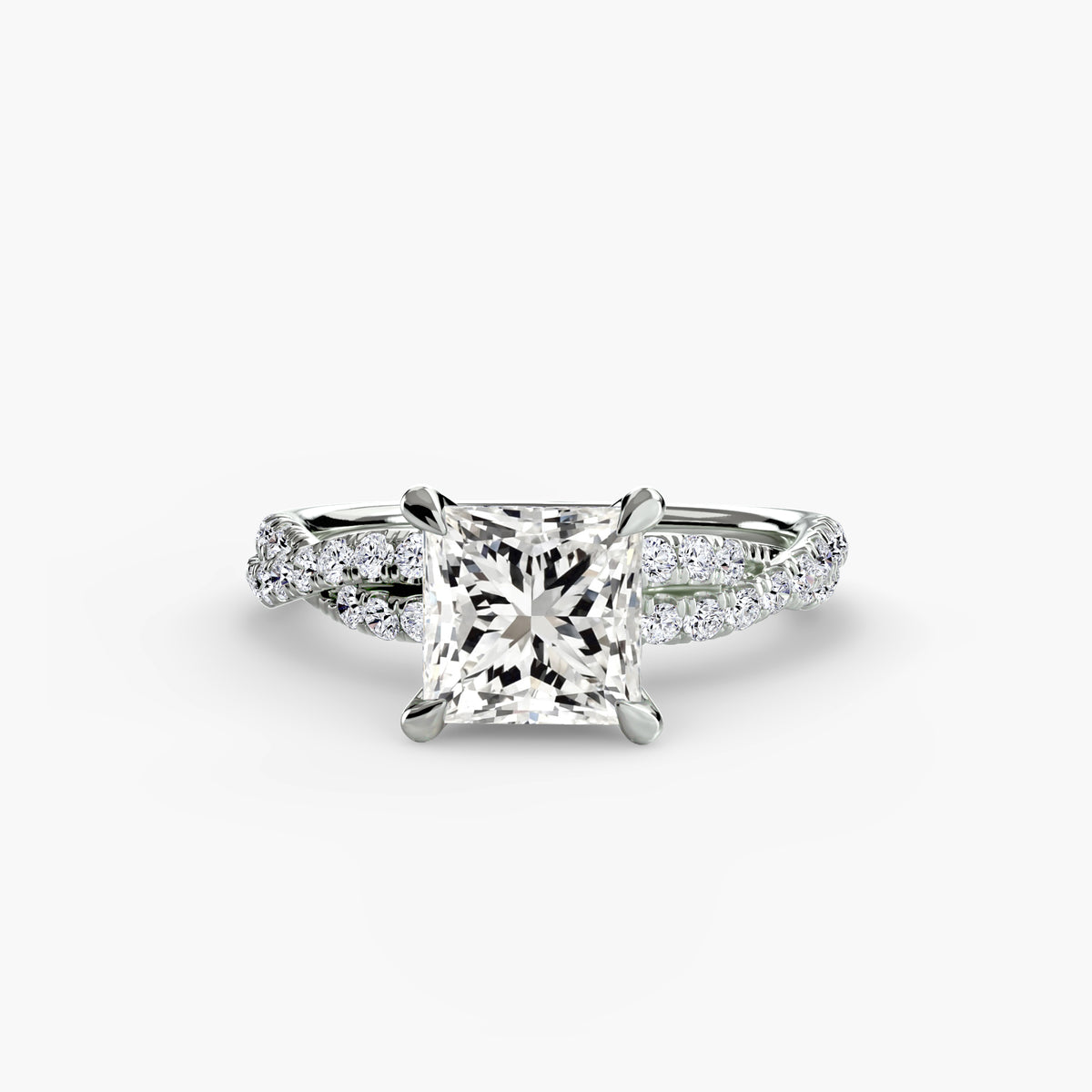 The Twisted Pavé Solitaire engagement ring in white gold with a princess-cut centre stone