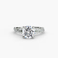 The Twisted Pavé Solitaire engagement ring in white gold with a round centre stone