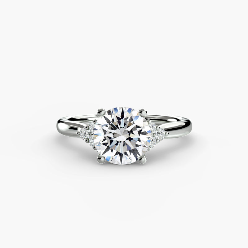 The Cadogan Round Solitaire with Cluster Shoulders