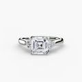 Solitaire with Cluster Shoulders engagement ring in white gold with an Asscher-cut centre stone