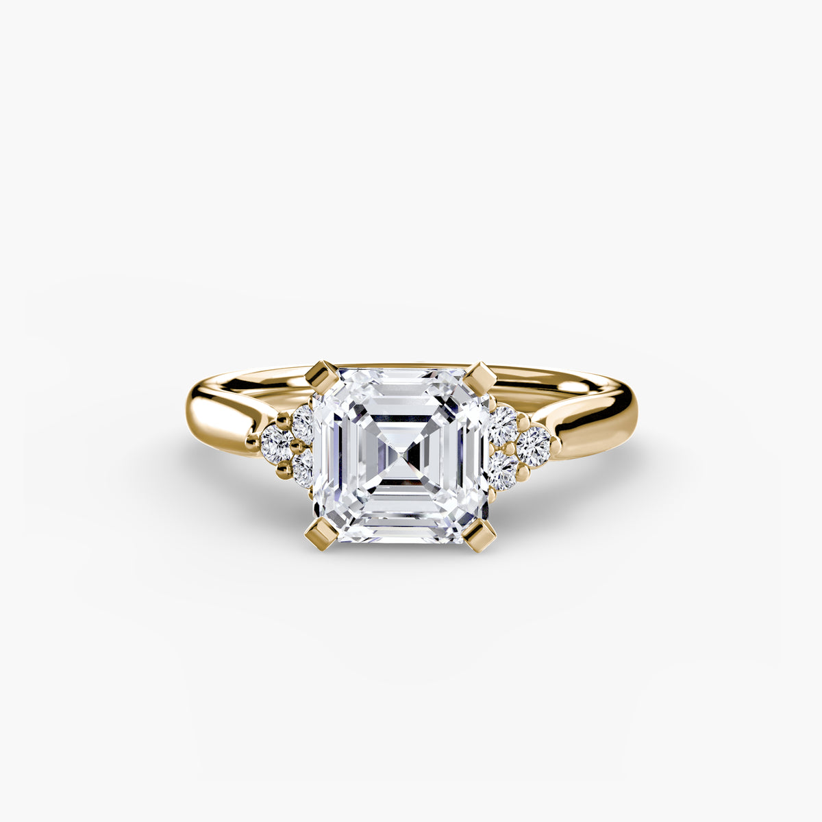 Solitaire with Cluster Shoulders engagement ring in yellow gold with an Asscher-cut centre stone