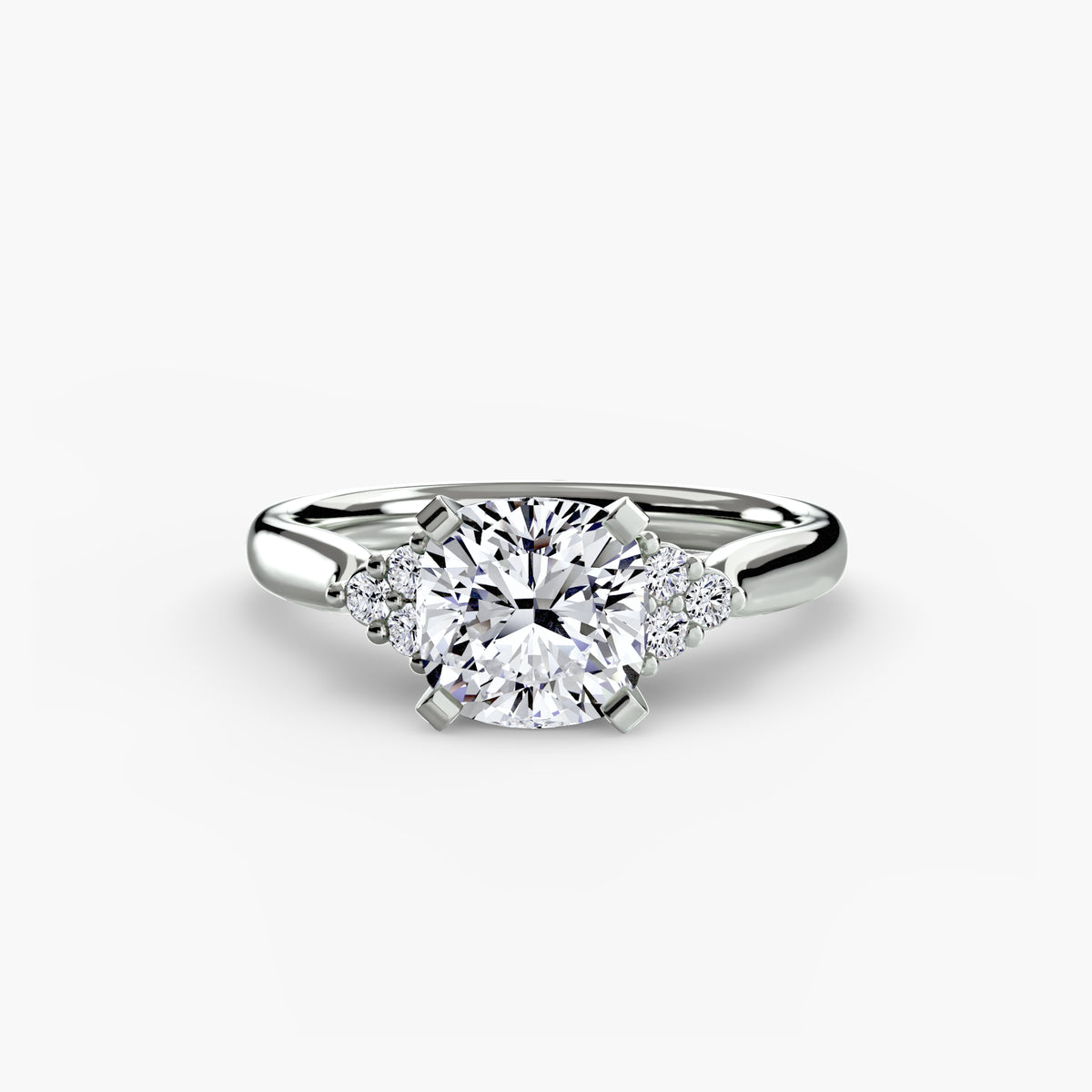 Solitaire with Cluster Shoulders engagement ring in white gold with a cushion-cut centre stone