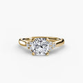 Solitaire with Cluster Shoulders engagement ring in yellow gold with a cushion-cut centre stone