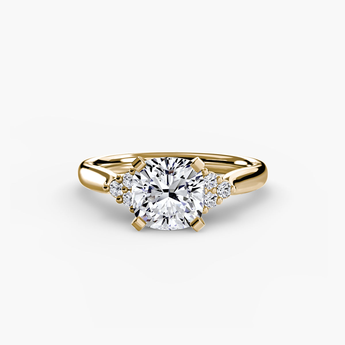 Solitaire with Cluster Shoulders engagement ring in yellow gold with a cushion-cut centre stone