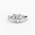 Solitaire with Cluster Shoulders engagement ring in white gold with a heart-shaped centre stone