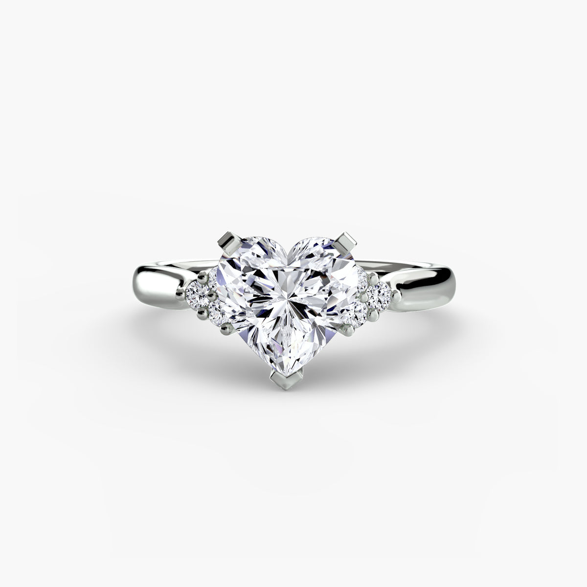 Solitaire with Cluster Shoulders engagement ring in white gold with a heart-shaped centre stone