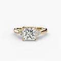 Solitaire with Cluster Shoulders engagement ring in yellow gold with a princess-cut centre stone