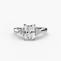 Solitaire with Cluster Shoulders engagement ring in white gold with a radiant-cut centre stone