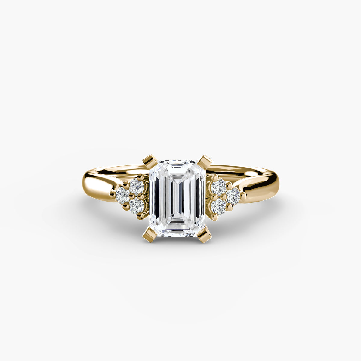 Solitaire with Cluster Shoulders engagement ring in yellow gold