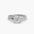 The Emerald Twist Pavé Ring in white gold with an Asscher-cut centre stone