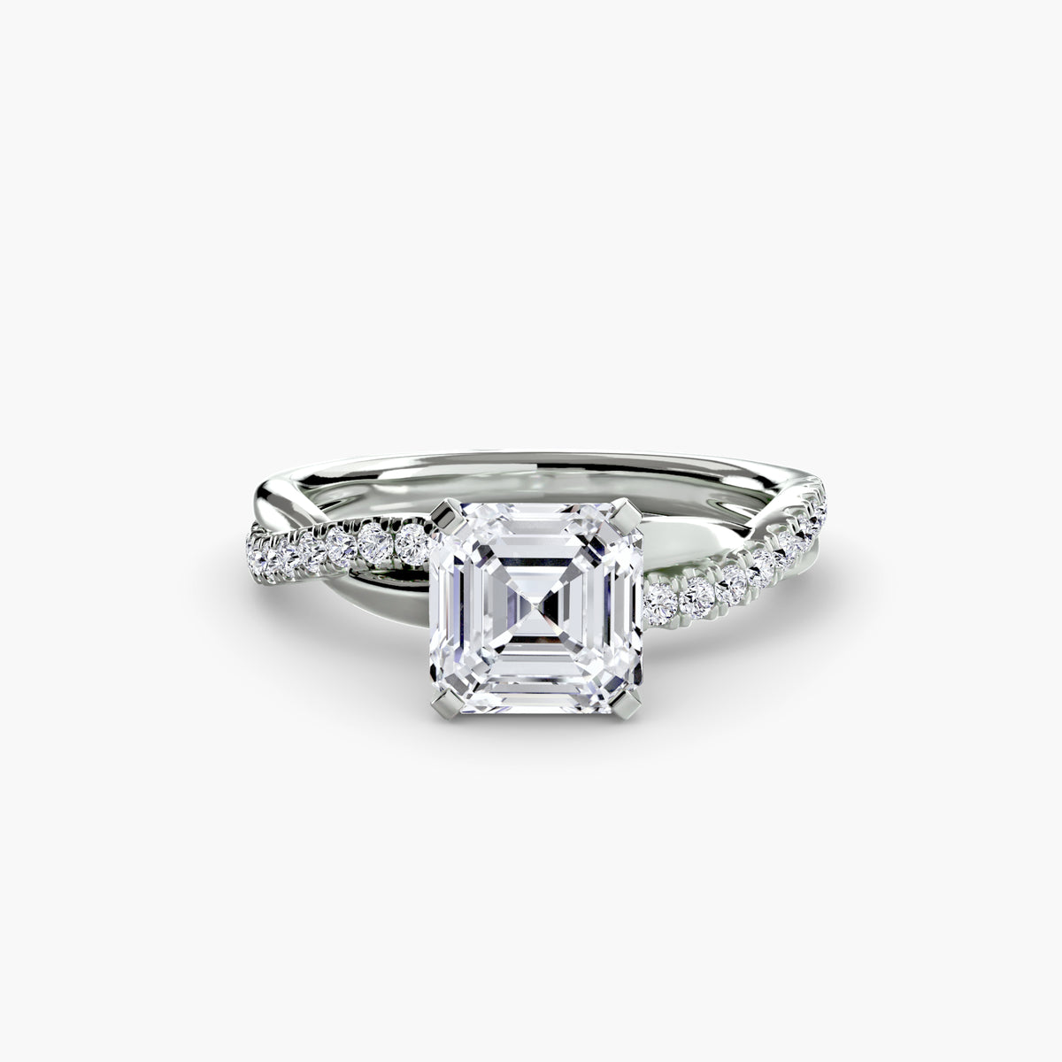 The Emerald Twist Pavé Ring in white gold with an Asscher-cut centre stone