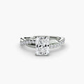 The Emerald Twist Pavé Ring in white gold with a radiant-cut centre stone