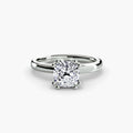 Solitaire ring in white gold with a cushion-cut centre stone