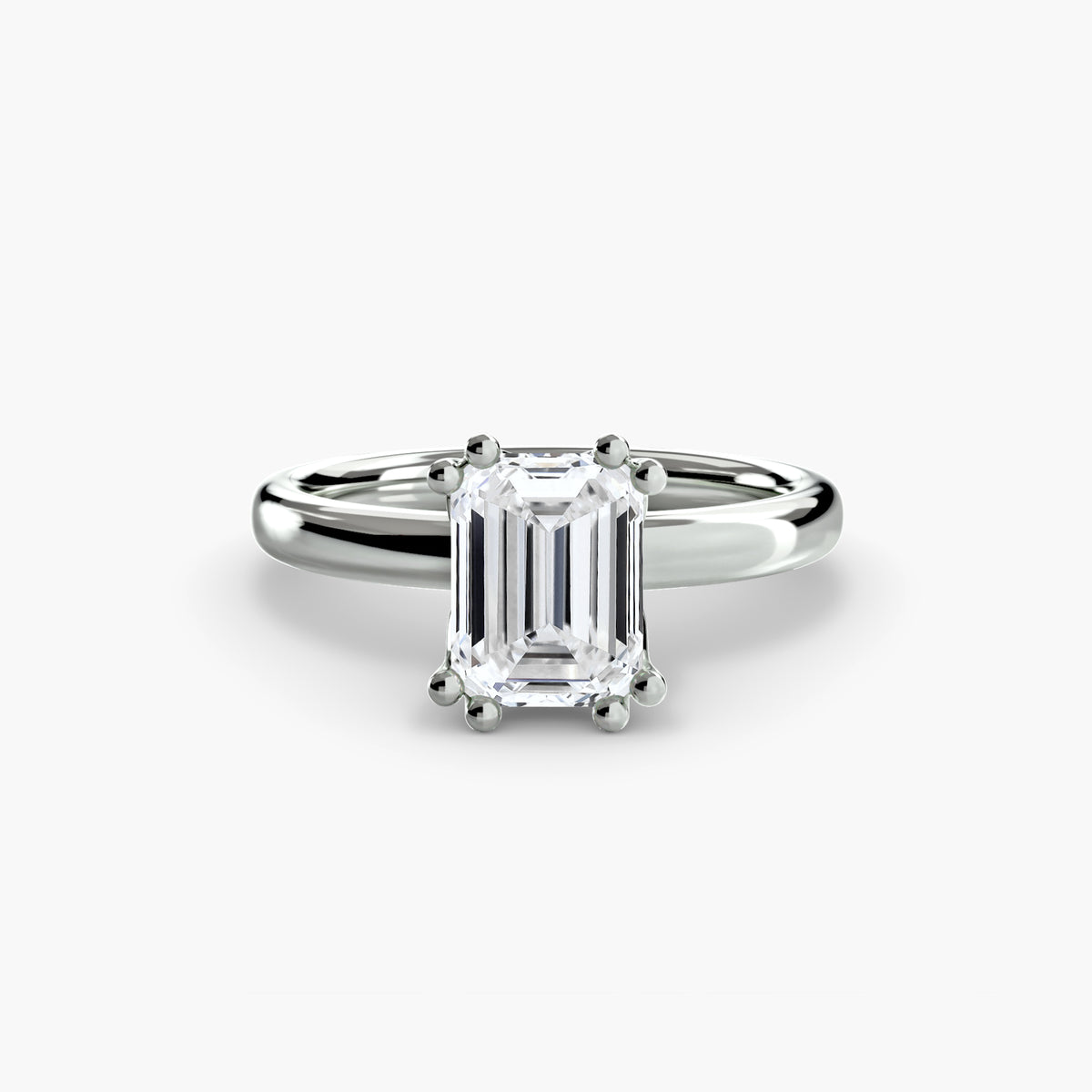 Solitaire ring in white gold with an emerald-cut centre stone