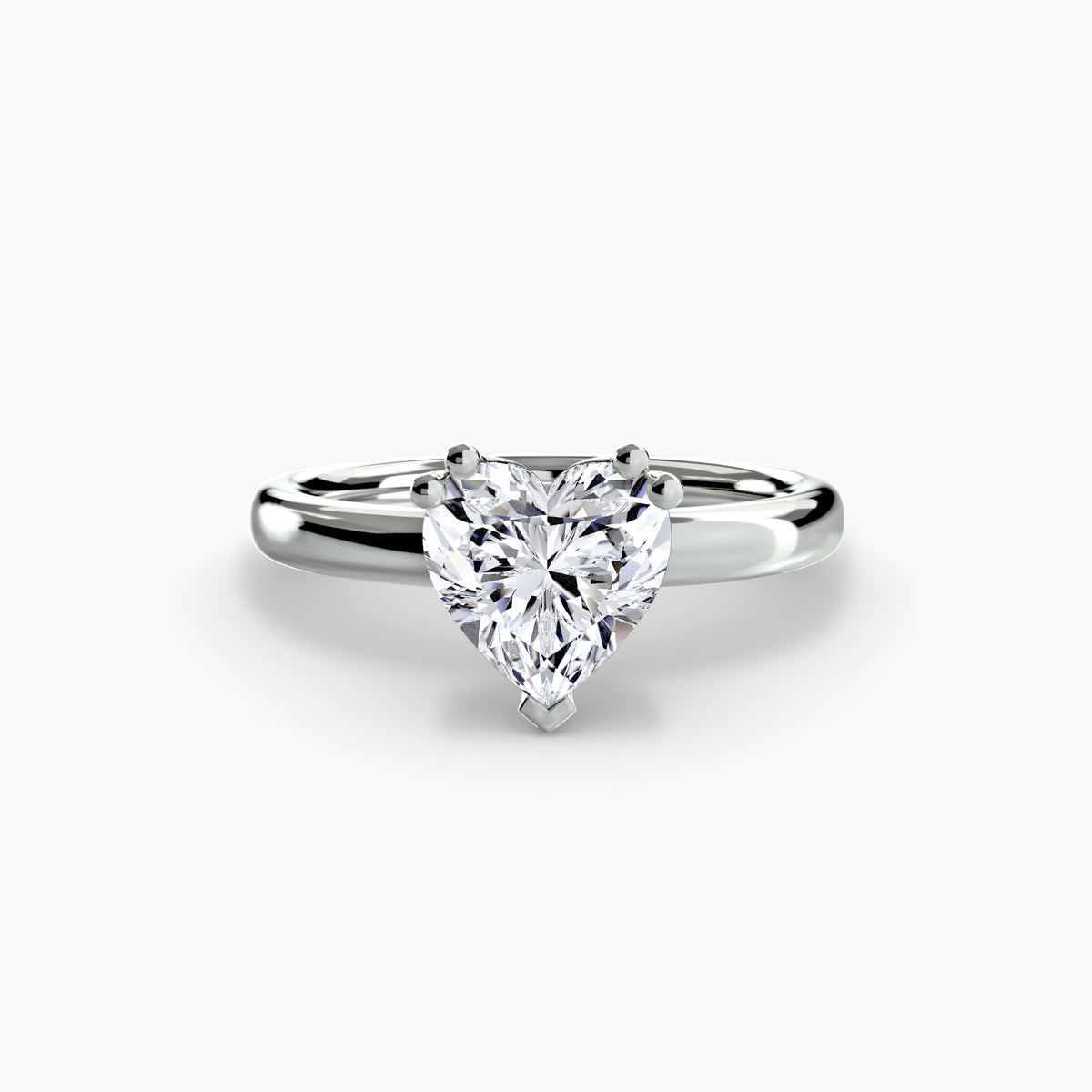Solitaire ring in white gold with a heart-shaped centre stone