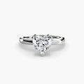 Solitaire ring in white gold with a heart-shaped centre stone
