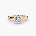 Solitaire ring in yellow gold with a heart-shaped centre stone