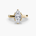 Solitaire ring in yellow gold with a marquise centre stone