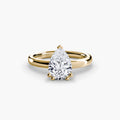 Solitaire ring in yellow gold with a pear-shaped centre stone