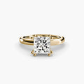 Solitaire ring in yellow gold with a princess-cut centre stone