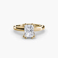 Solitaire ring in yellow gold with a radiant-cut centre stone
