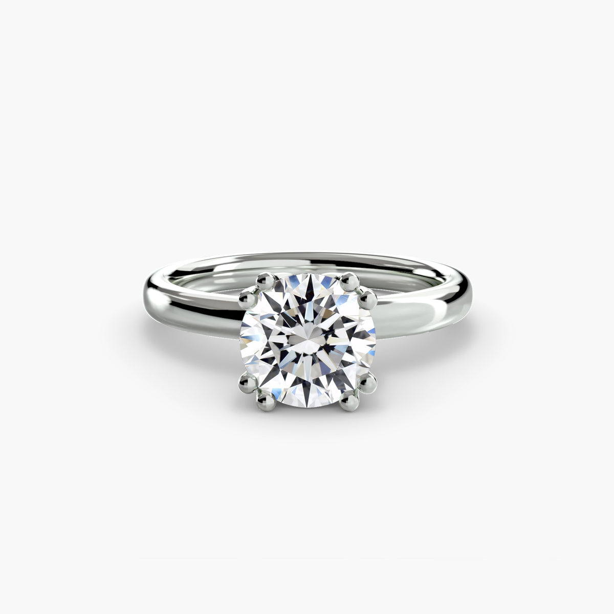Solitaire ring in white gold with a round centre stone