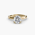 Solitaire ring in yellow gold with a round centre stone