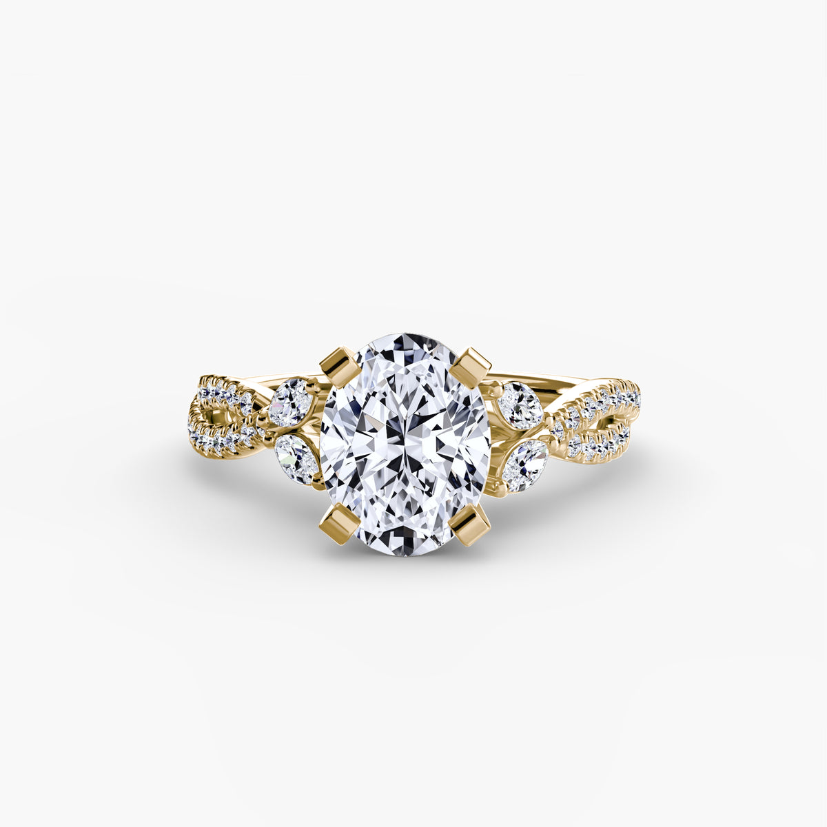 The Twist Pavé Ring in yellow gold with a round centre stone