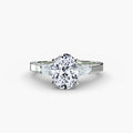 Three Stone with Pavé Shoulders engagement ring in white gold with an oval centre stone