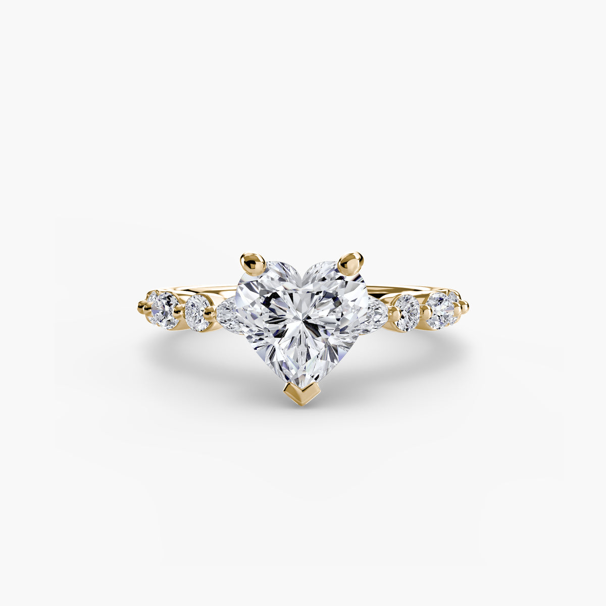 Solitaire with Eternity Pavé engagement ring in yellow gold with a heart-shaped centre stone