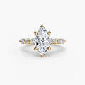 Solitaire with Eternity Pavé engagement ring in yellow gold with a marquise centre stone