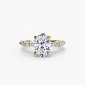 Solitaire with Eternity Pavé engagement ring in yellow gold with an oval centre stone