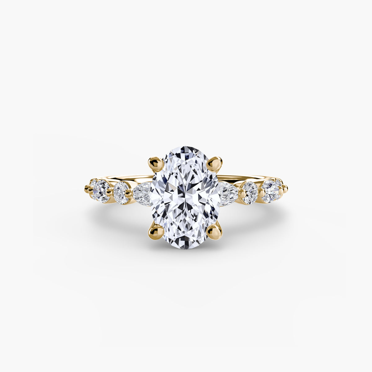 Solitaire with Eternity Pavé engagement ring in yellow gold with an oval centre stone