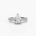 Solitaire with Eternity Pavé engagement ring in white gold with a pear-shaped centre stone