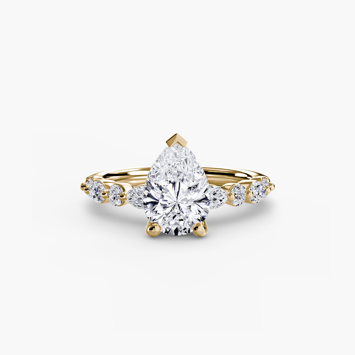 Solitaire with Eternity Pavé engagement ring in yellow gold with a pear-shaped centre stone