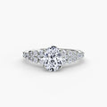 The Celestial Cluster Ring in white gold with an oval centre stone