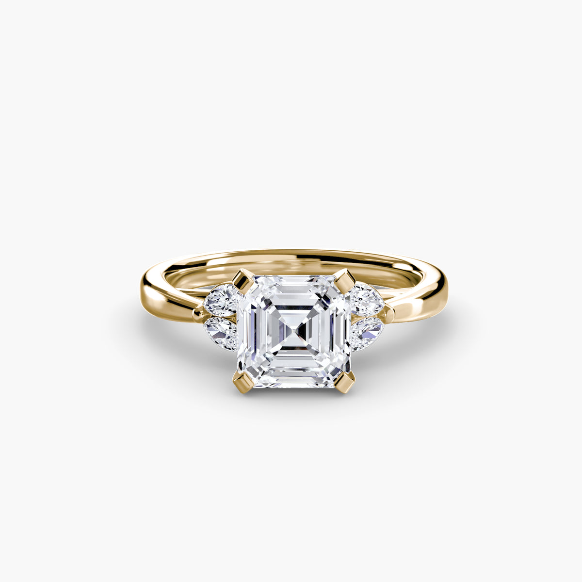 The Celestial Cluster Ring in yellow gold with an Asscher-cut centre stone