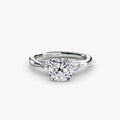 The Celestial Cluster Ring in white gold with a cushion-cut centre stone