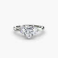 The Celestial Cluster Ring in white gold with a heart-shaped centre stone