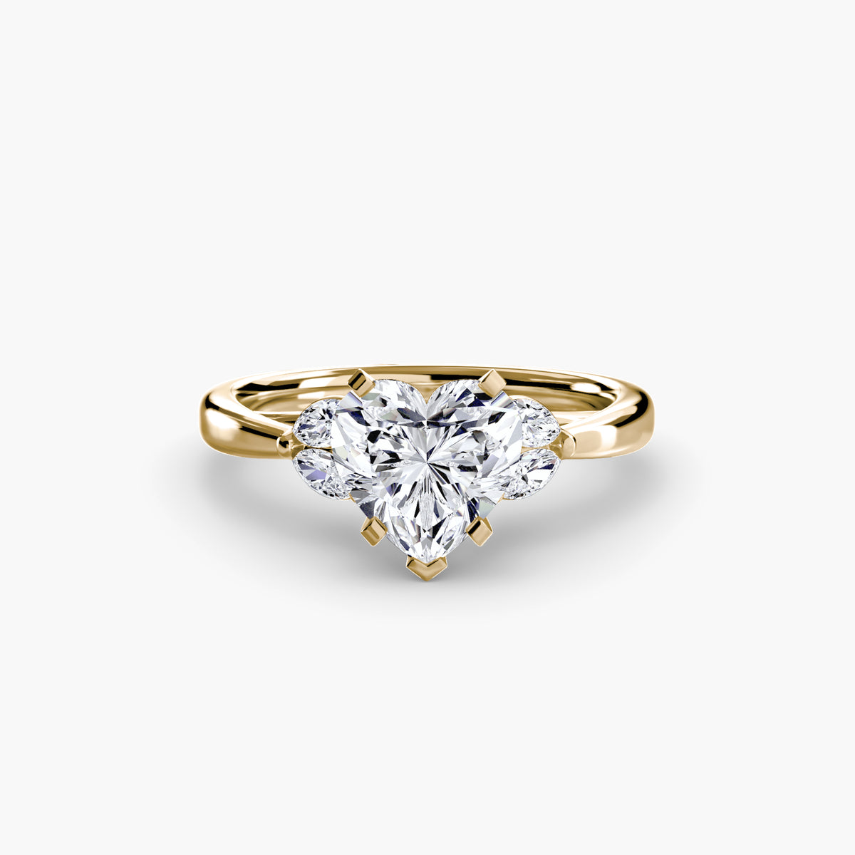 The Celestial Cluster Ring in yellow gold with a heart-shaped centre stone