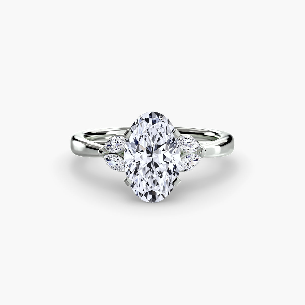 The Celestial Cluster Ring in white gold with an oval centre stone