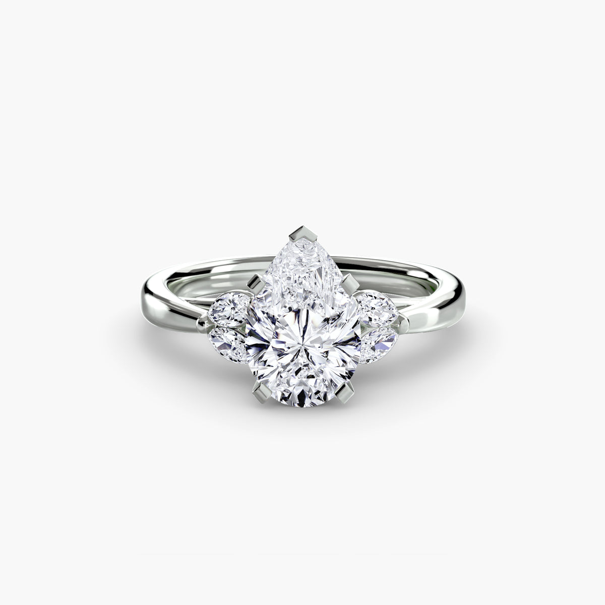 The Celestial Cluster Ring in white gold with a pear-shaped centre stone