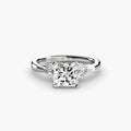 The Celestial Cluster Ring in white gold with a princess-cut centre stone