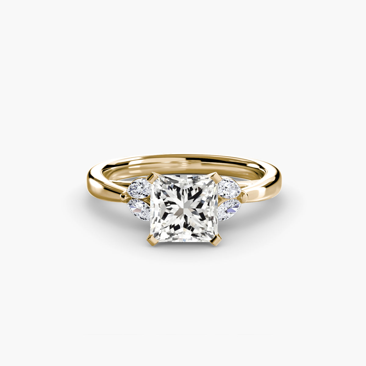 The Celestial Cluster Ring in yellow gold with a princess-cut centre stone