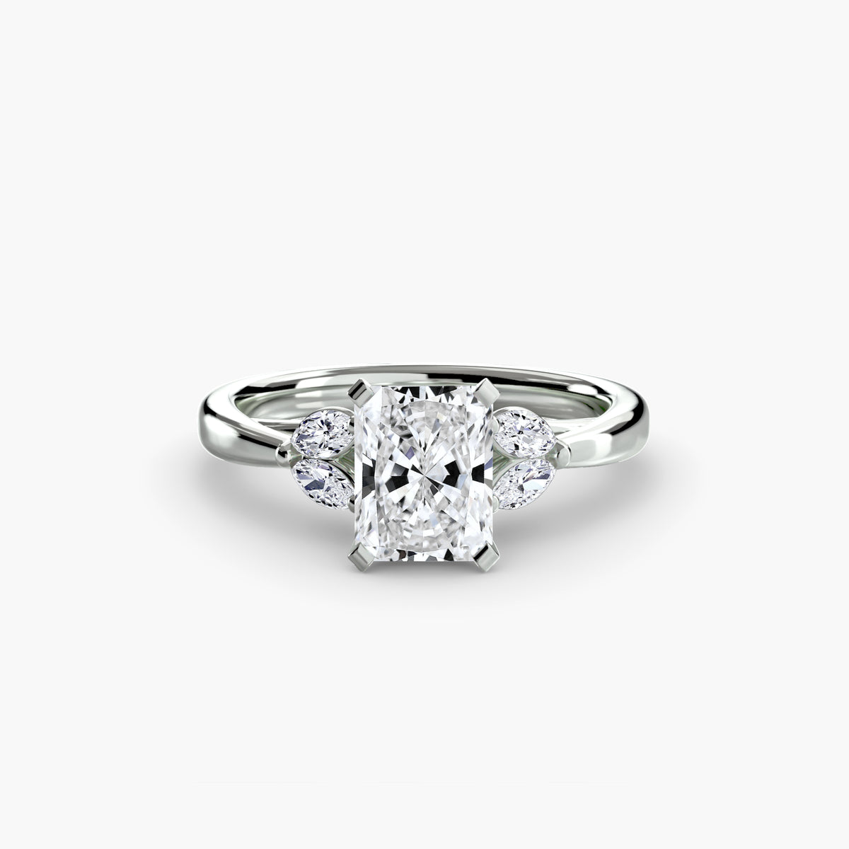 The Celestial Cluster Ring in white gold with a radiant-cut centre stone
