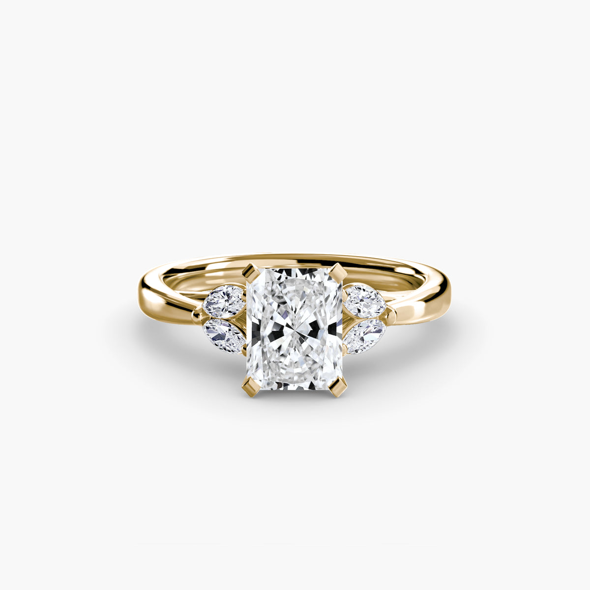 The Celestial Cluster Ring in yellow gold with a radiant-cut centre stone