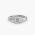 The Celestial Cluster Ring in white gold with a round centre stone