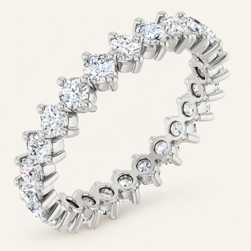 1.5ct Natural Diamond Full Eternity Ring – Elegant Claw Design in white metal on an ivory background
