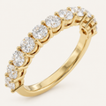 Lab-grown diamond half eternity ring in yellow gold on an ivory background